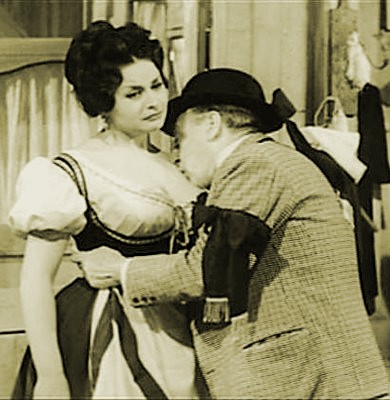 Tot e Angela Luce in una scena del film "Signori si nasce"